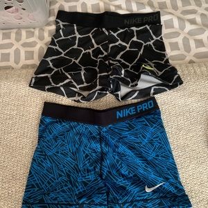 2 pairs of nike pros